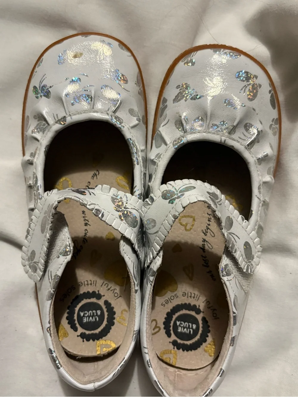 Livie & Luca White Mary Jane Shoes with Silver Holographic Butterflies